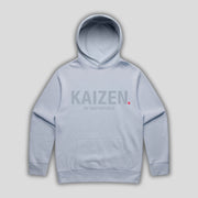 Blue hoodie with 'KAIZEN' text, folded flat on grey background