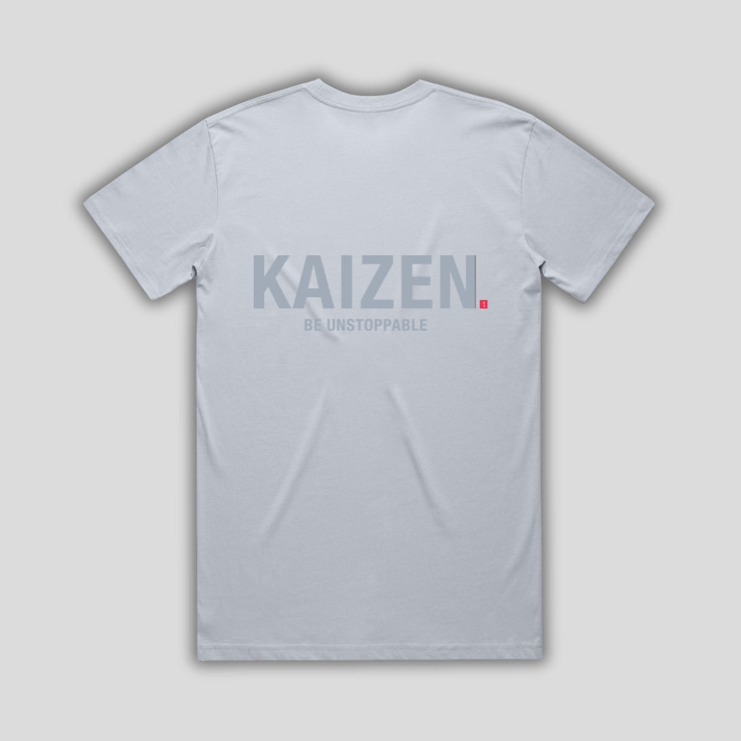Blue t-shirt with 'KAIZEN' logo, flat lay on neutral background