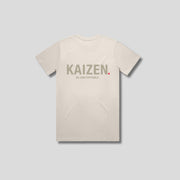 Bone t-shirt with 'KAIZEN' logo, flat lay on neutral background
