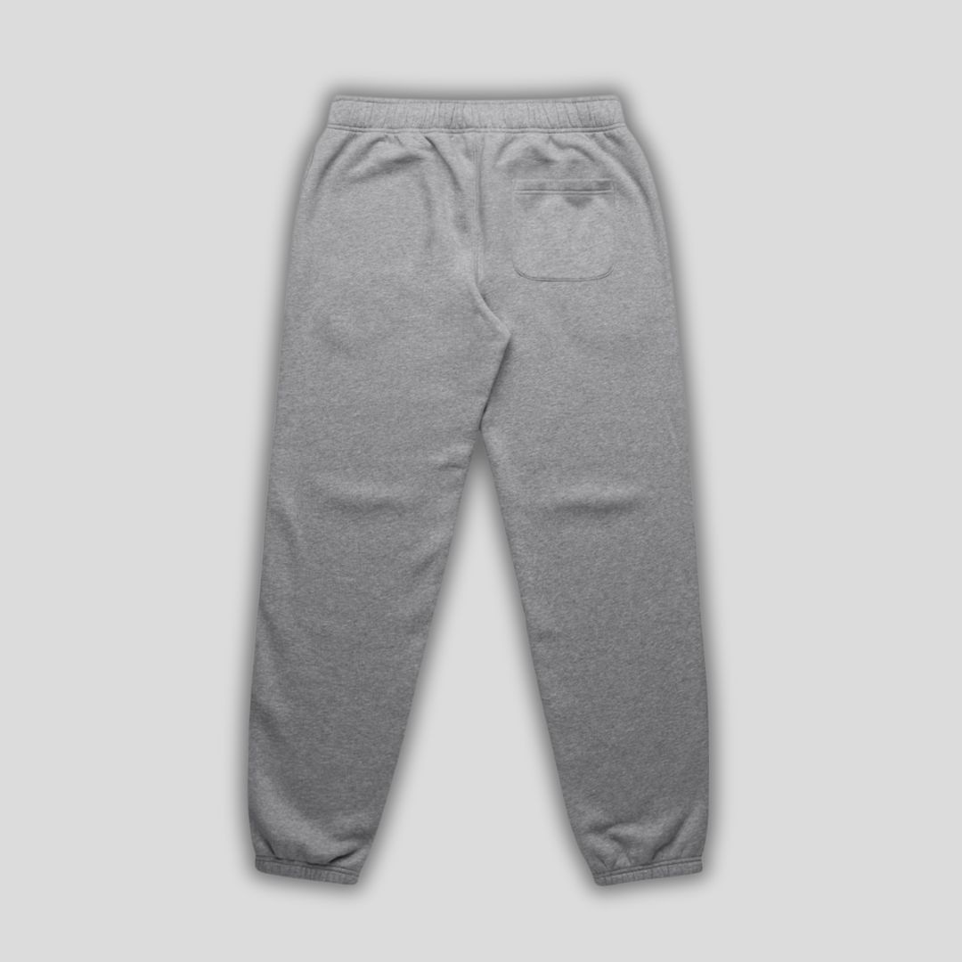 Grey joggers with 'KAIZEN' logo, flat lay product image
