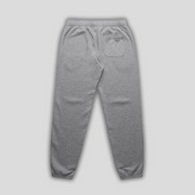 Grey joggers with 'KAIZEN' logo, flat lay product image