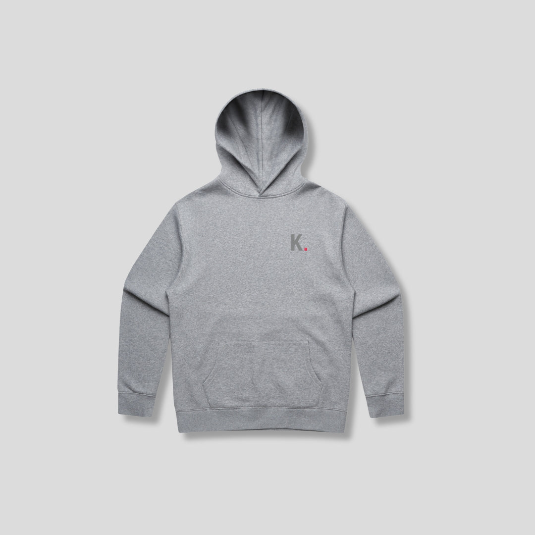 Grey hoodie with 'KAIZEN' text, folded flat on grey background