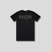 Black t-shirt with 'KAIZEN' logo, flat lay on neutral background