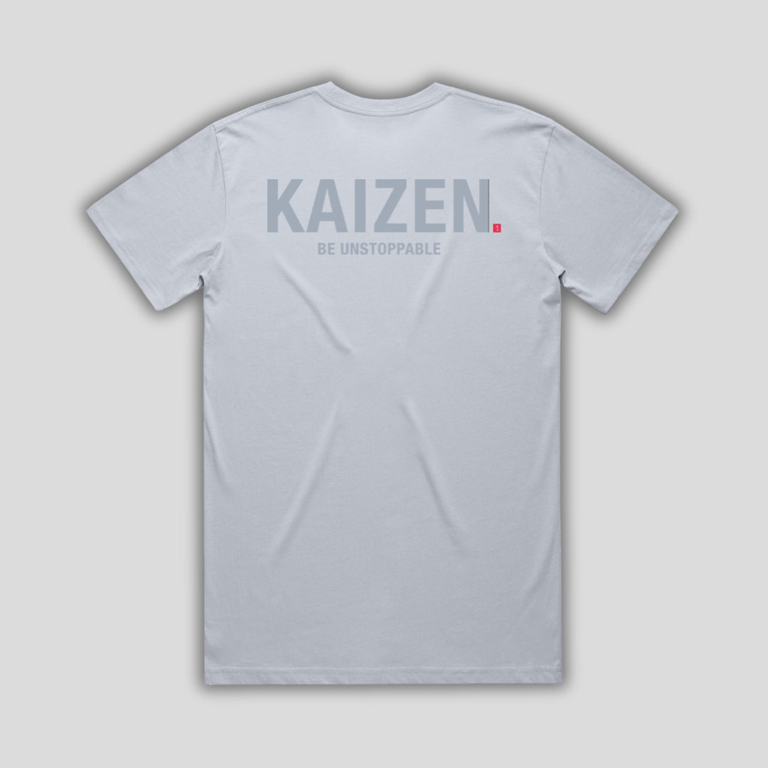 Blue t-shirt with 'KAIZEN' logo, flat lay on neutral background