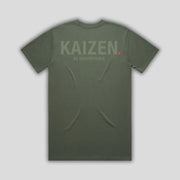 Green t-shirt with 'KAIZEN' logo, flat lay on neutral background