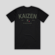 Black t-shirt with 'KAIZEN' logo, flat lay on neutral background
