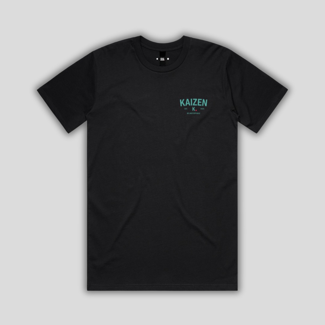 Black t-shirt with 'KAIZEN' logo, flat lay on neutral background