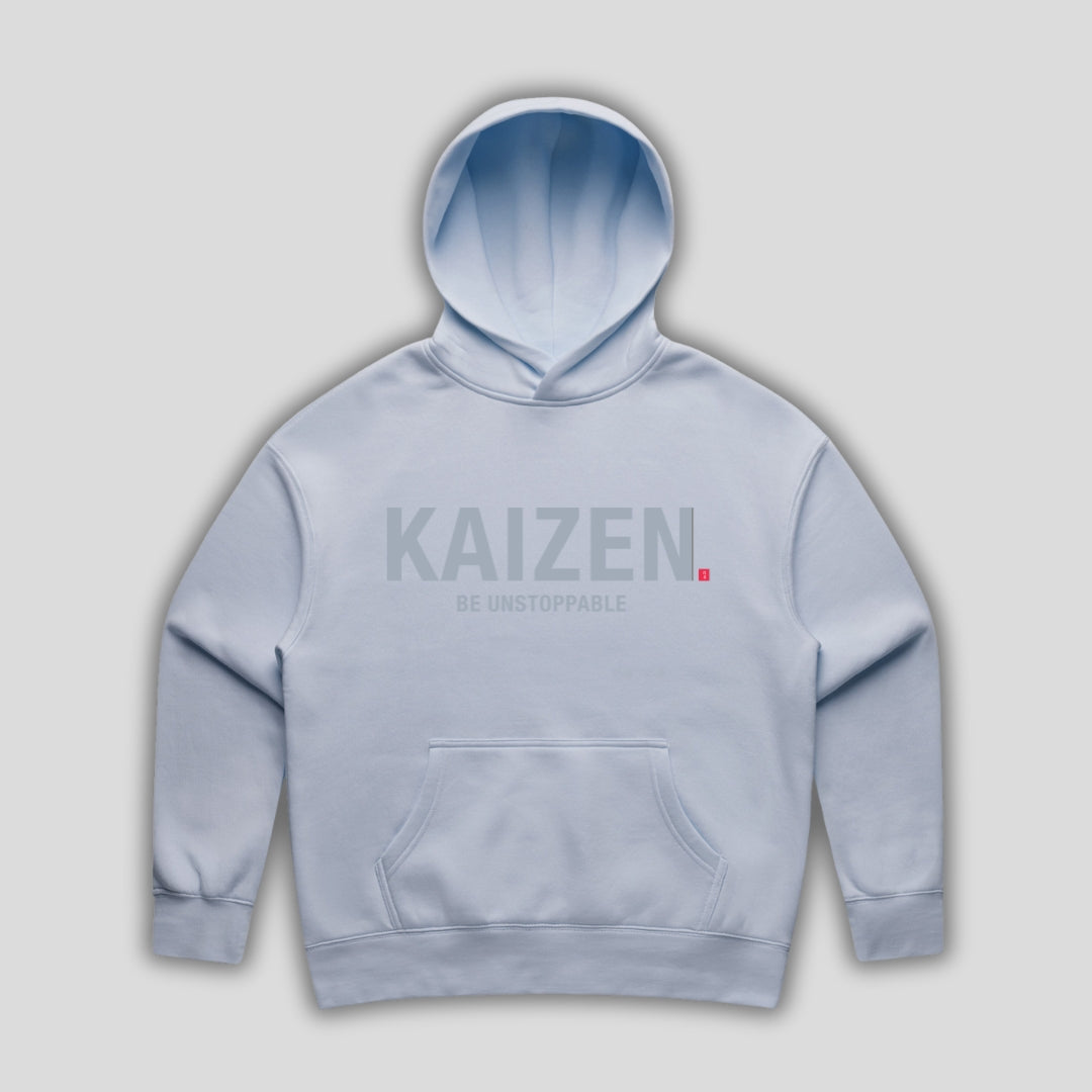 Blue hoodie with 'KAIZEN' text, folded flat on grey background