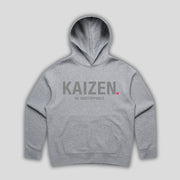 Grey hoodie with 'KAIZEN' text, folded flat on grey background