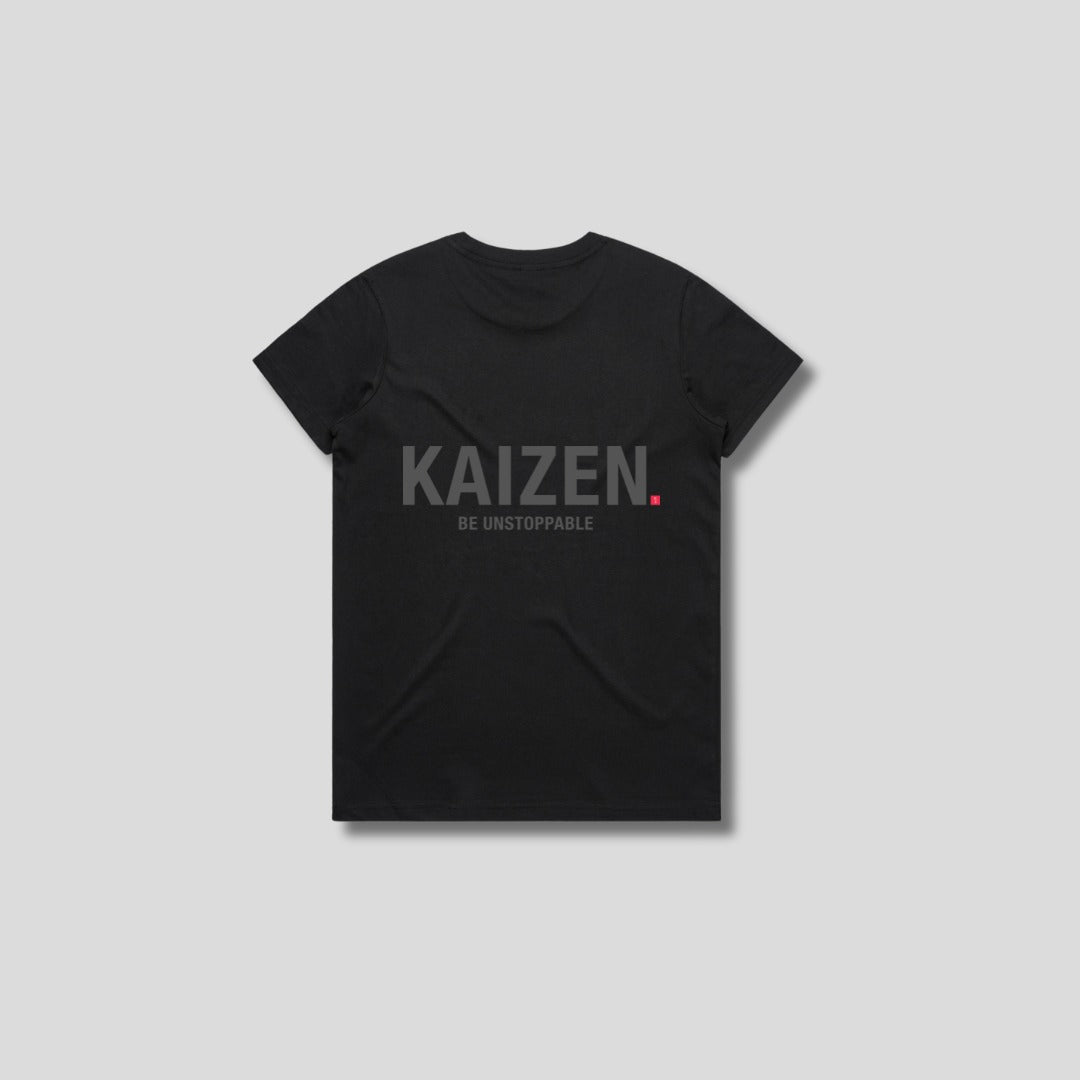 Black t-shirt with 'KAIZEN' logo, flat lay on neutral background