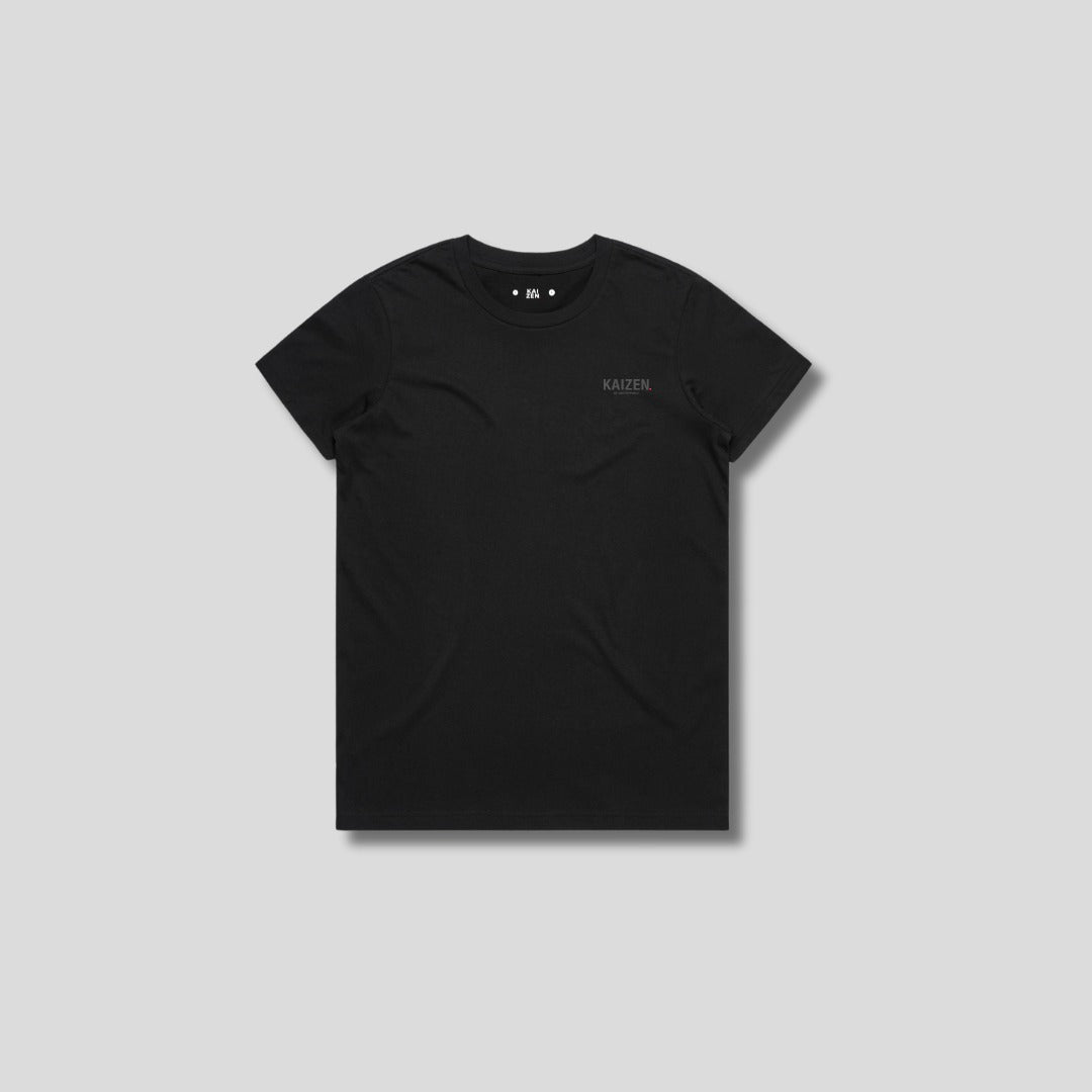 Black t-shirt with 'KAIZEN' logo, flat lay on neutral background