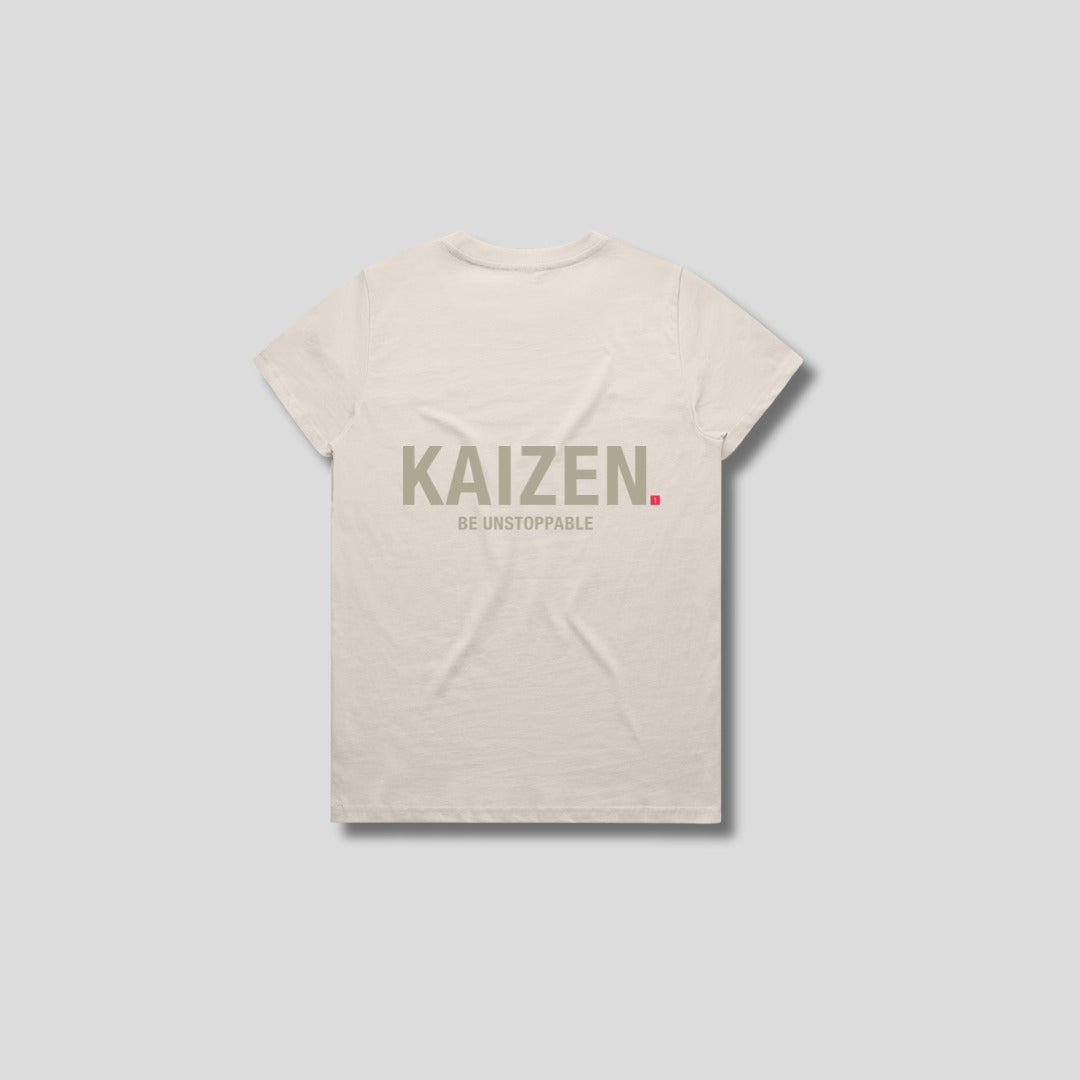 Bone t-shirt with 'KAIZEN' logo, flat lay on neutral background