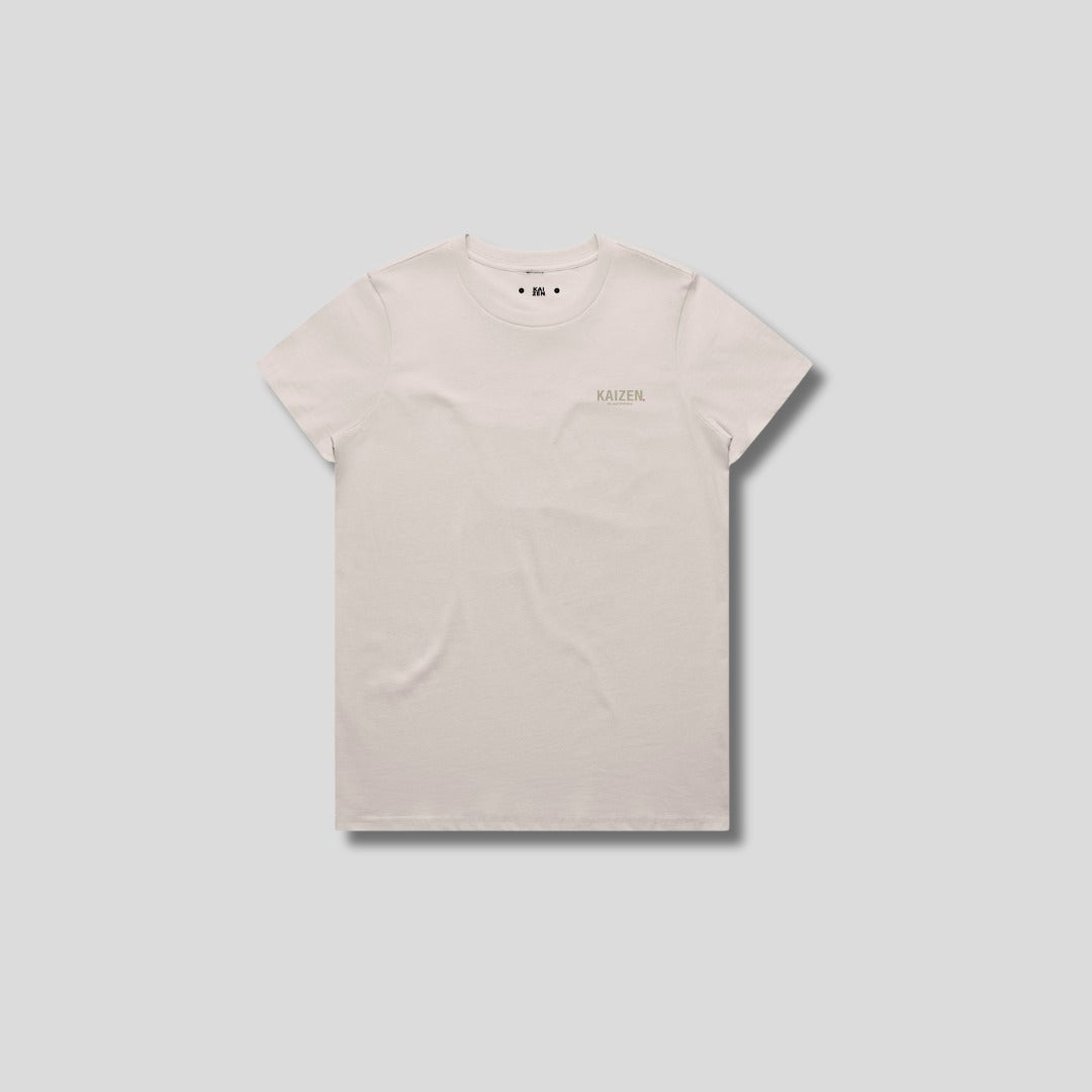 Bone t-shirt with 'KAIZEN' logo, flat lay on neutral background