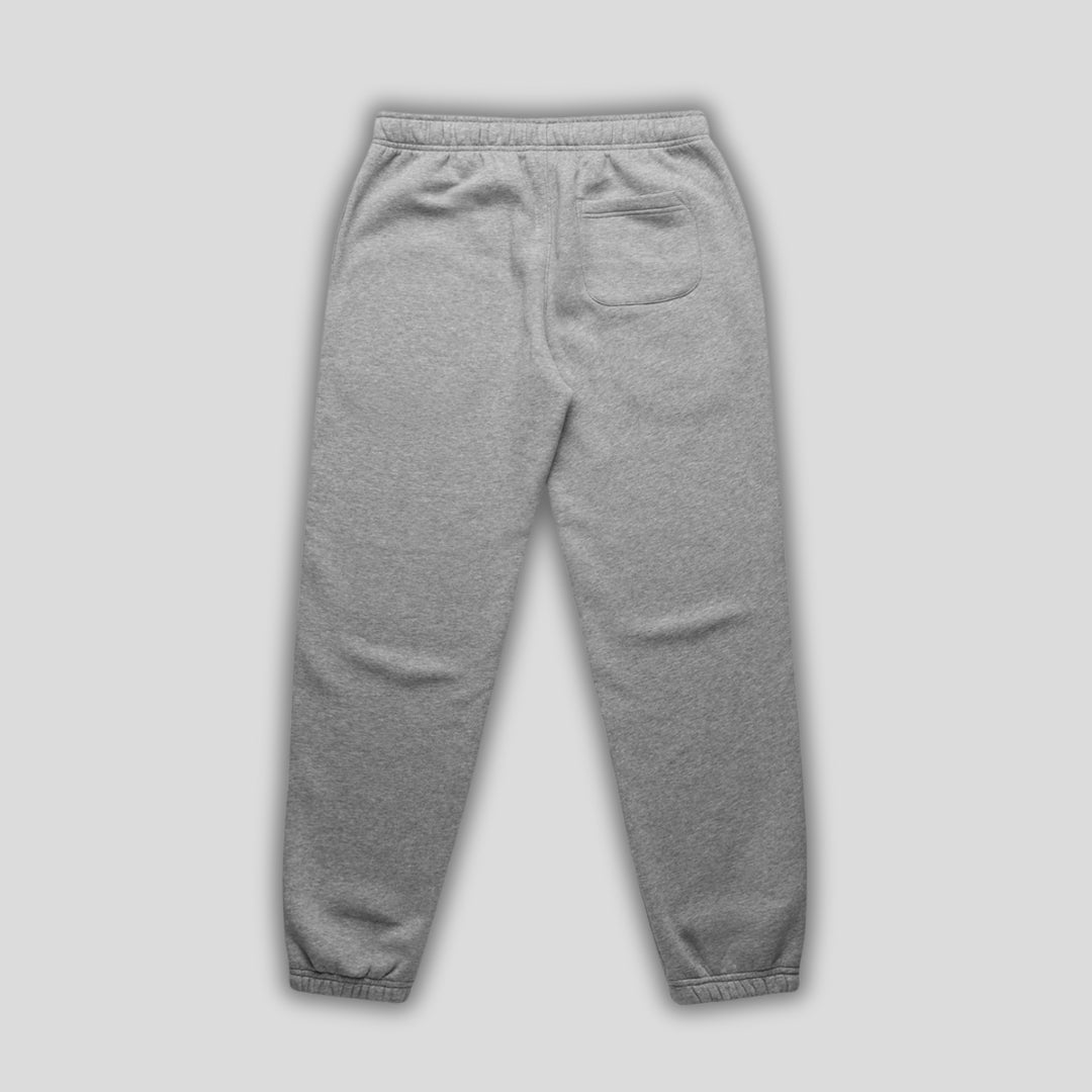 Grey joggers with 'KAIZEN' logo, flat lay product image