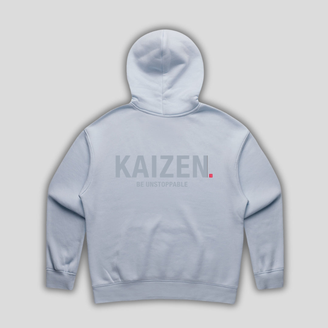 Blue hoodie with 'KAIZEN' text, folded flat on grey background