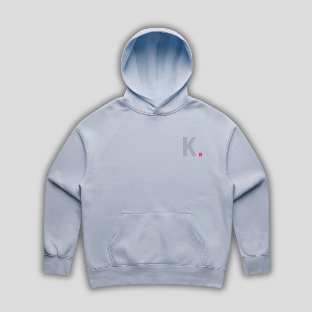 Blue hoodie with 'KAIZEN' text, folded flat on grey background