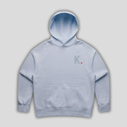 Blue hoodie with 'KAIZEN' text, folded flat on grey background
