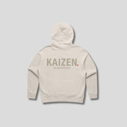 Bone hoodie with 'KAIZEN' text, folded flat on grey background