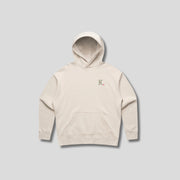 Bone hoodie with 'KAIZEN' text, folded flat on grey background