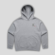 Grey hoodie with 'KAIZEN' text, folded flat on grey background