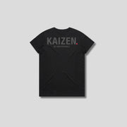 Black t-shirt with 'KAIZEN' logo, flat lay on neutral background
