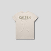 Bone t-shirt with 'KAIZEN' logo, flat lay on neutral background