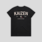 Black t-shirt with 'KAIZEN' logo, flat lay on neutral background