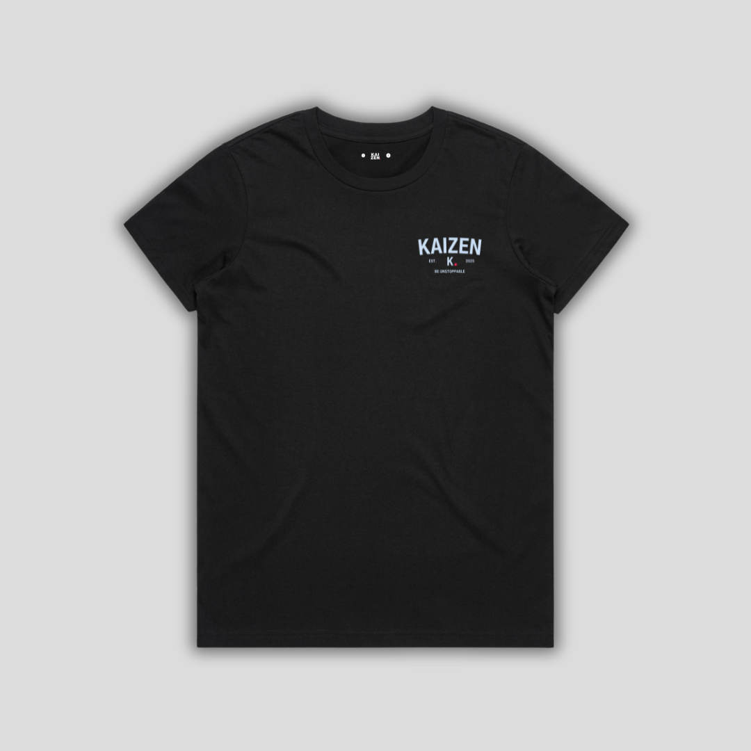 Black t-shirt with 'KAIZEN' logo, flat lay on neutral background
