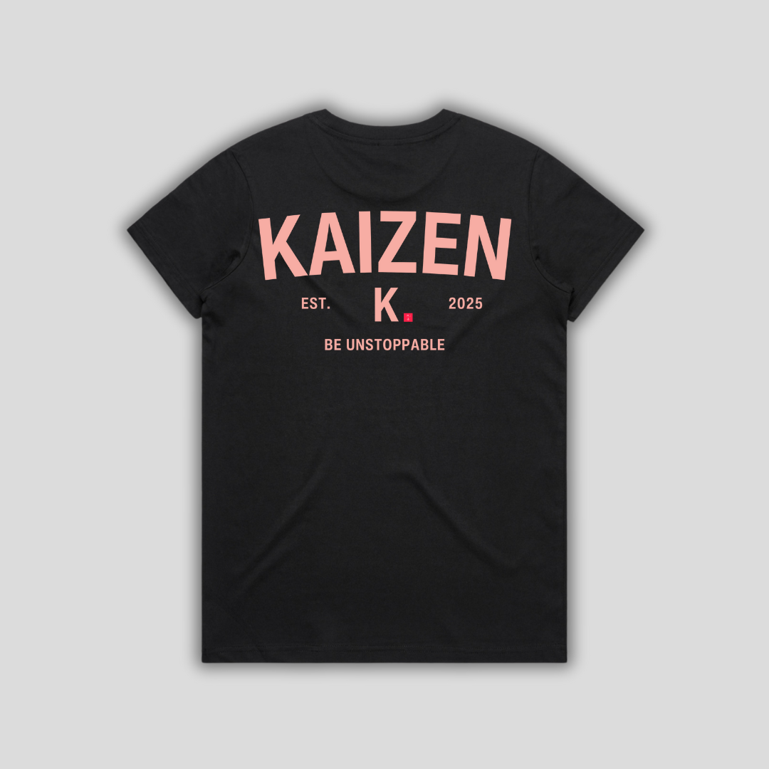 Black t-shirt with 'KAIZEN' logo, flat lay on neutral background