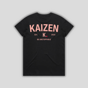 Black t-shirt with 'KAIZEN' logo, flat lay on neutral background