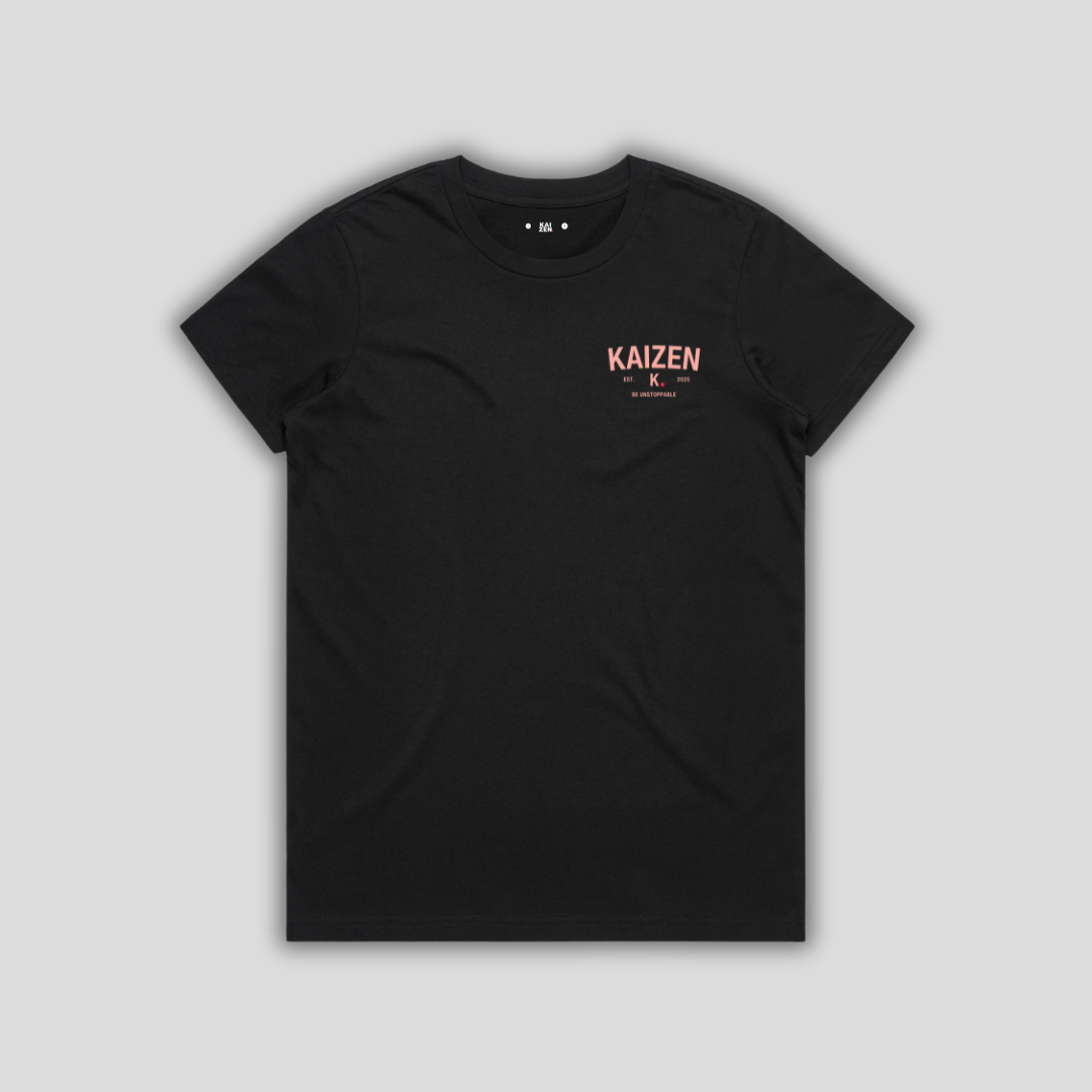 Black t-shirt with 'KAIZEN' logo, flat lay on neutral background
