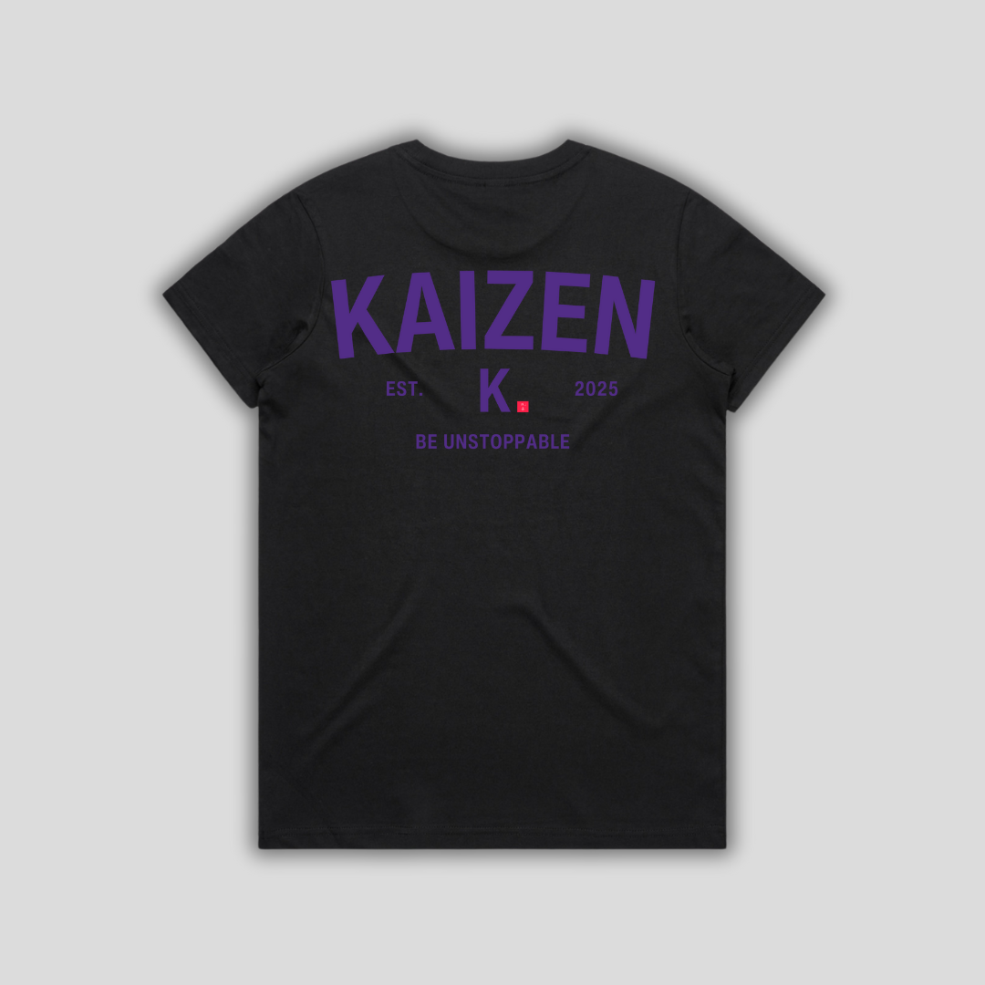 Black t-shirt with 'KAIZEN' logo, flat lay on neutral background