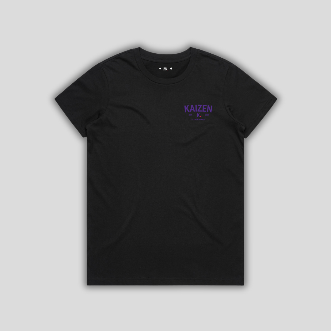 Black t-shirt with 'KAIZEN' logo, flat lay on neutral background