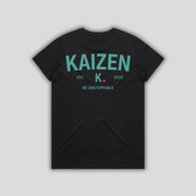 Black t-shirt with 'KAIZEN' logo, flat lay on neutral background